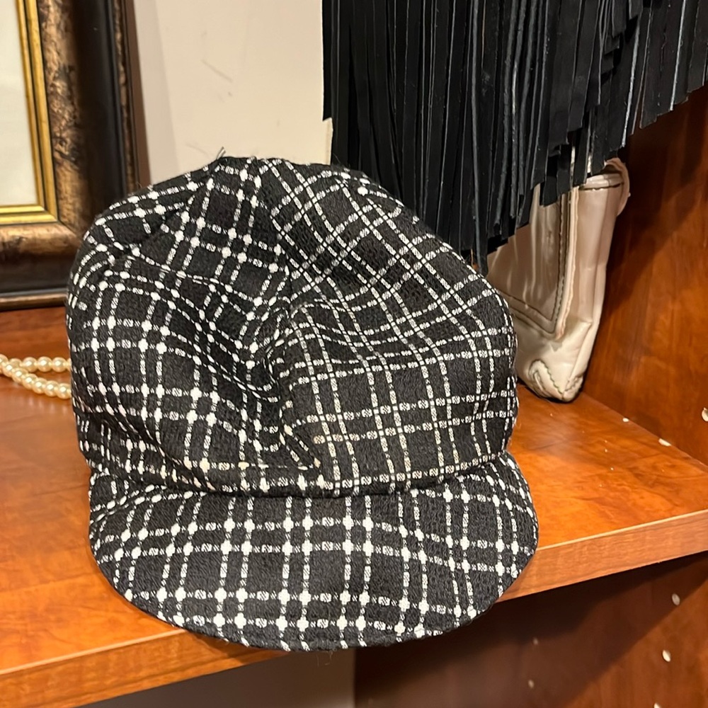 Black and white checkered newsboy cap